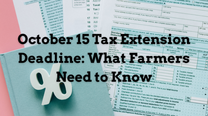 Blue tax forms and a blue book on top in the corner with a percent sign